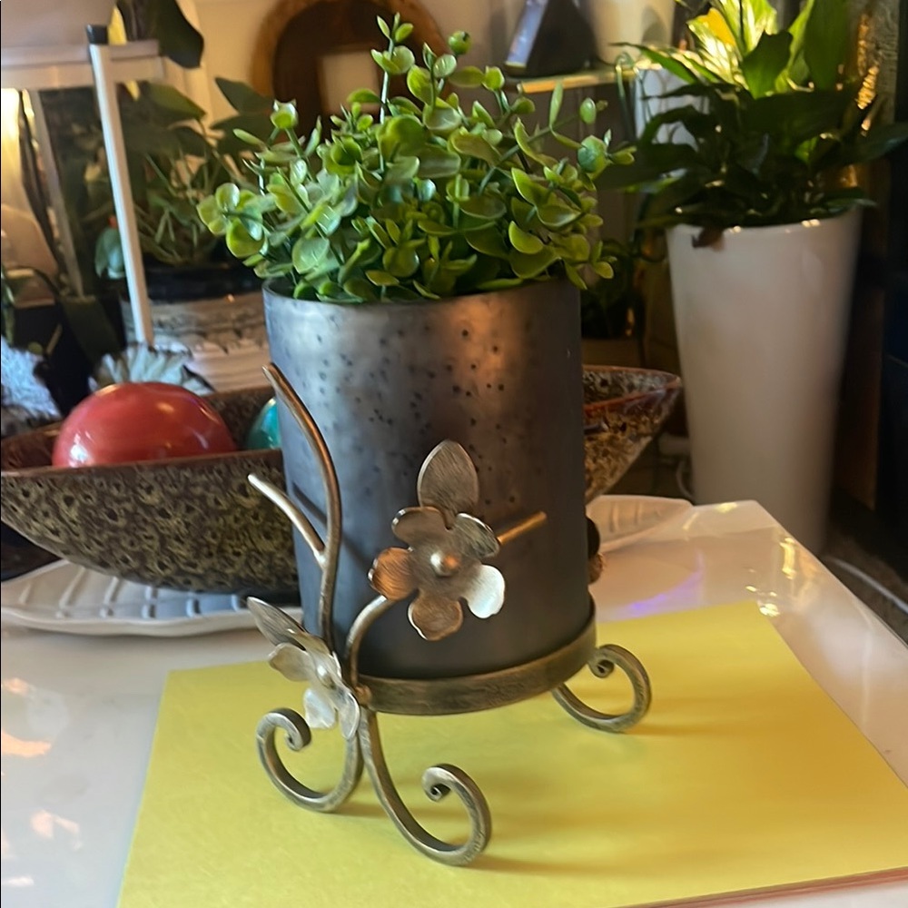 Elegant Black and Gold Planter with Floral Design